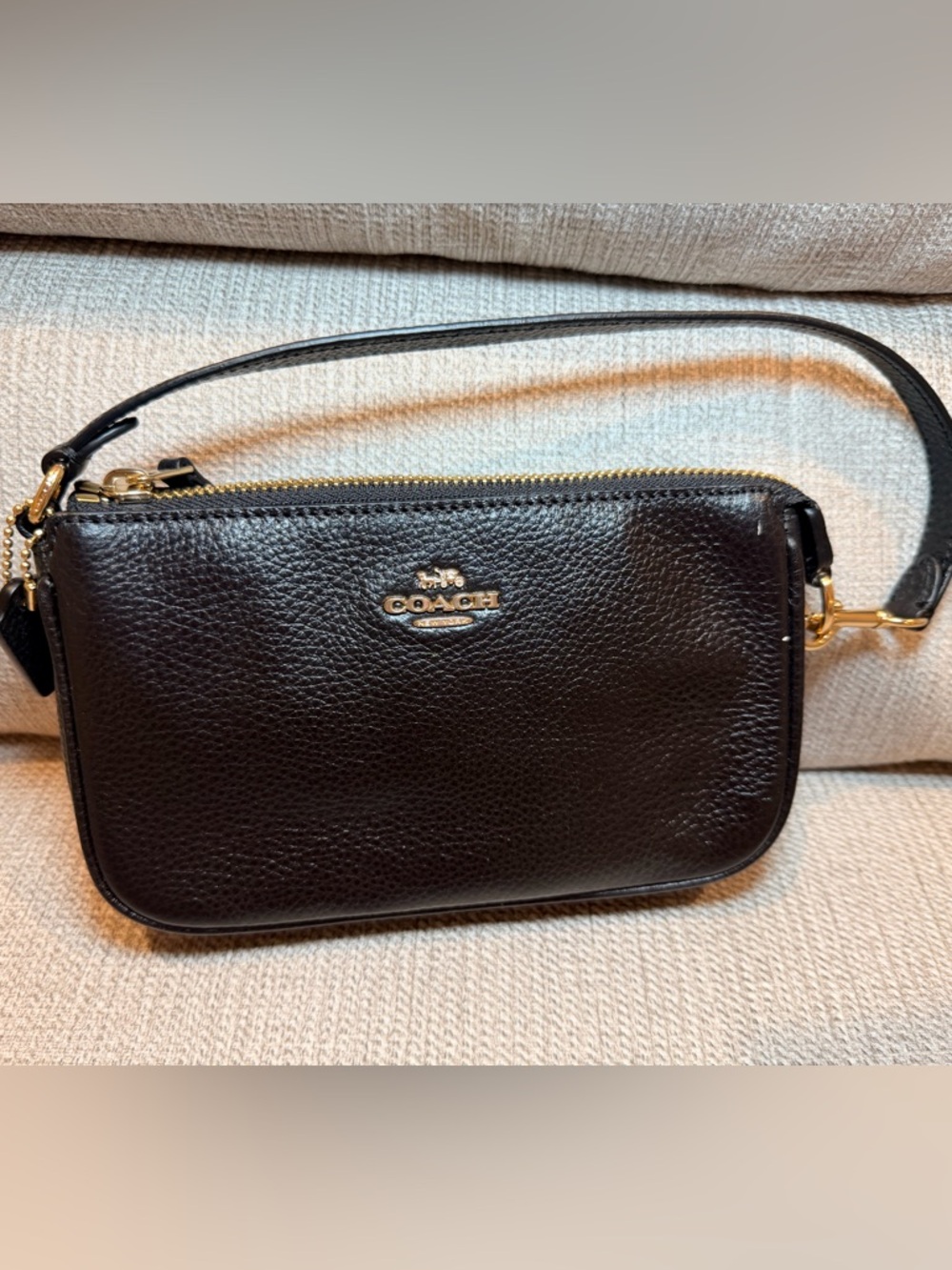 Coach Black Pebbled Leather shoulder bag/wristlet with Gold Emblem